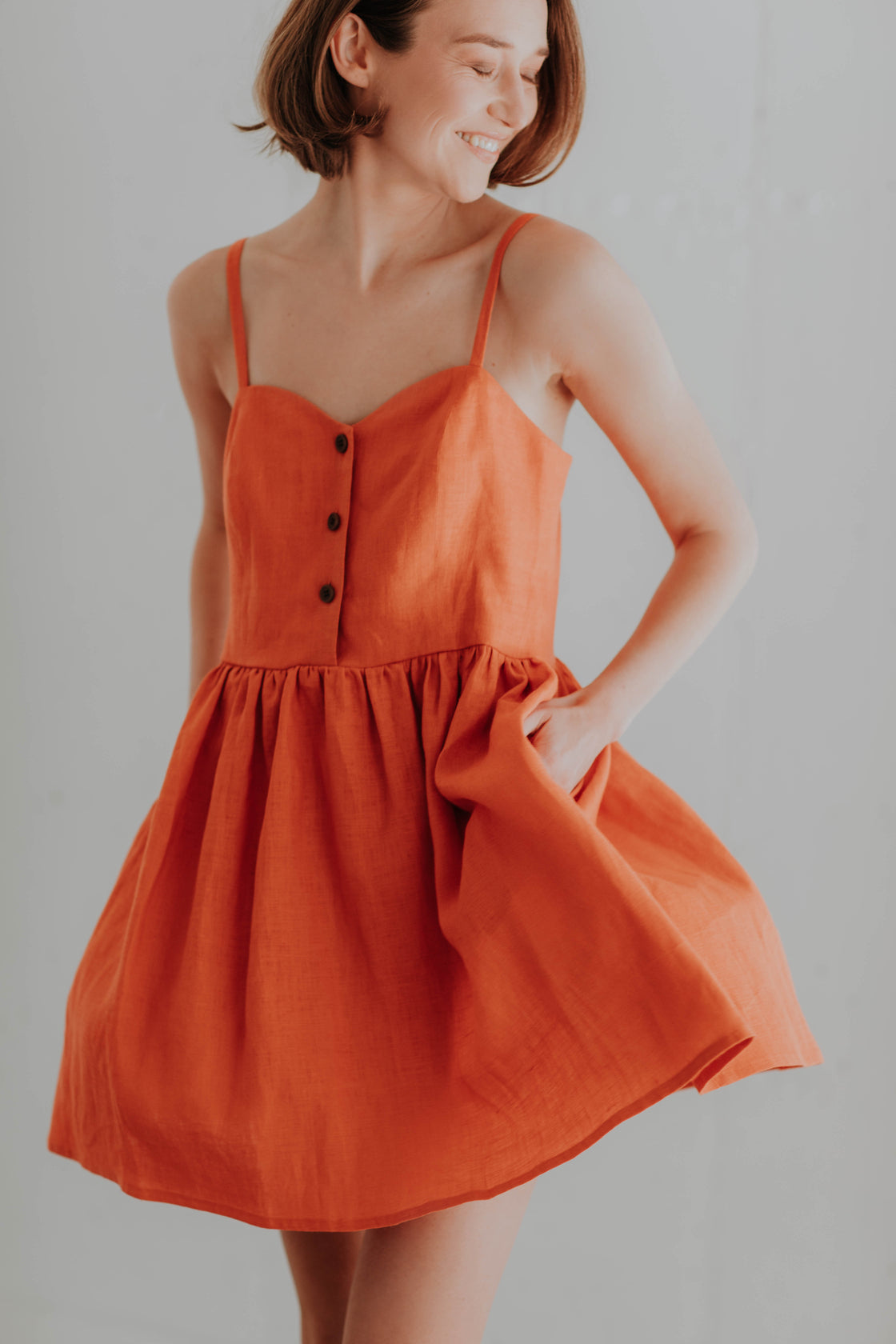 Mini linen dress with buttons